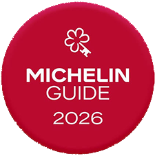 El logotipo circular de Michelin Guide 2026 aparece sobre un fondo blanco.
